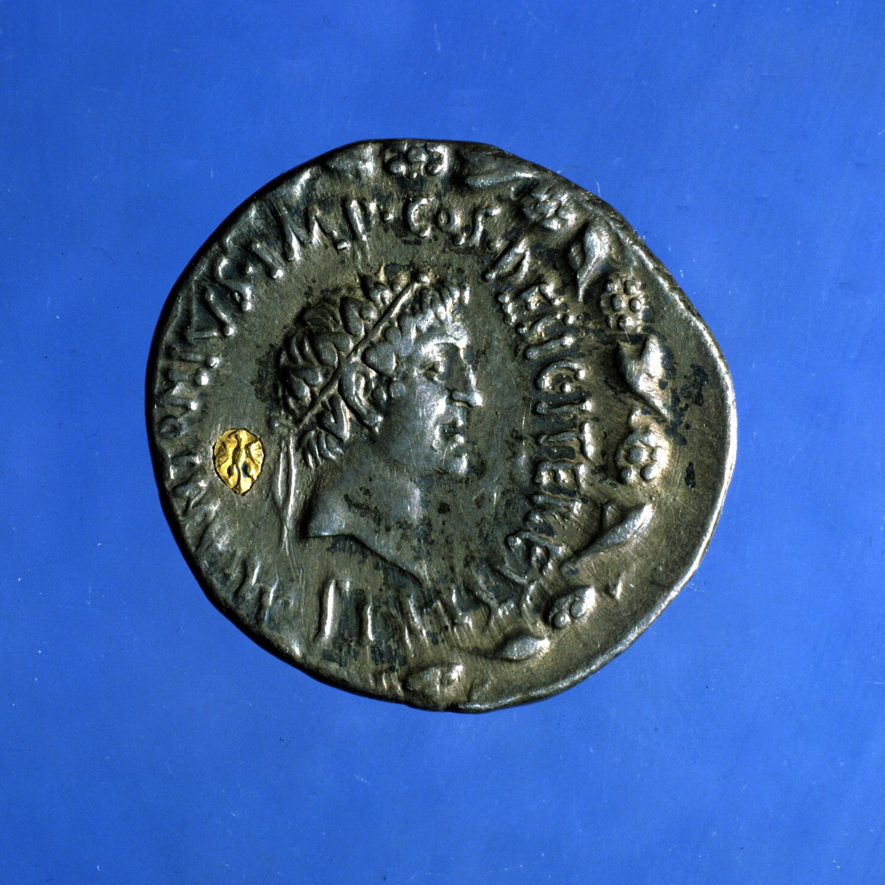 Silver and gold coin with the effigy of Anthony or Marc Antony, a Roman politician who reigned with Cleopatra. by Roman