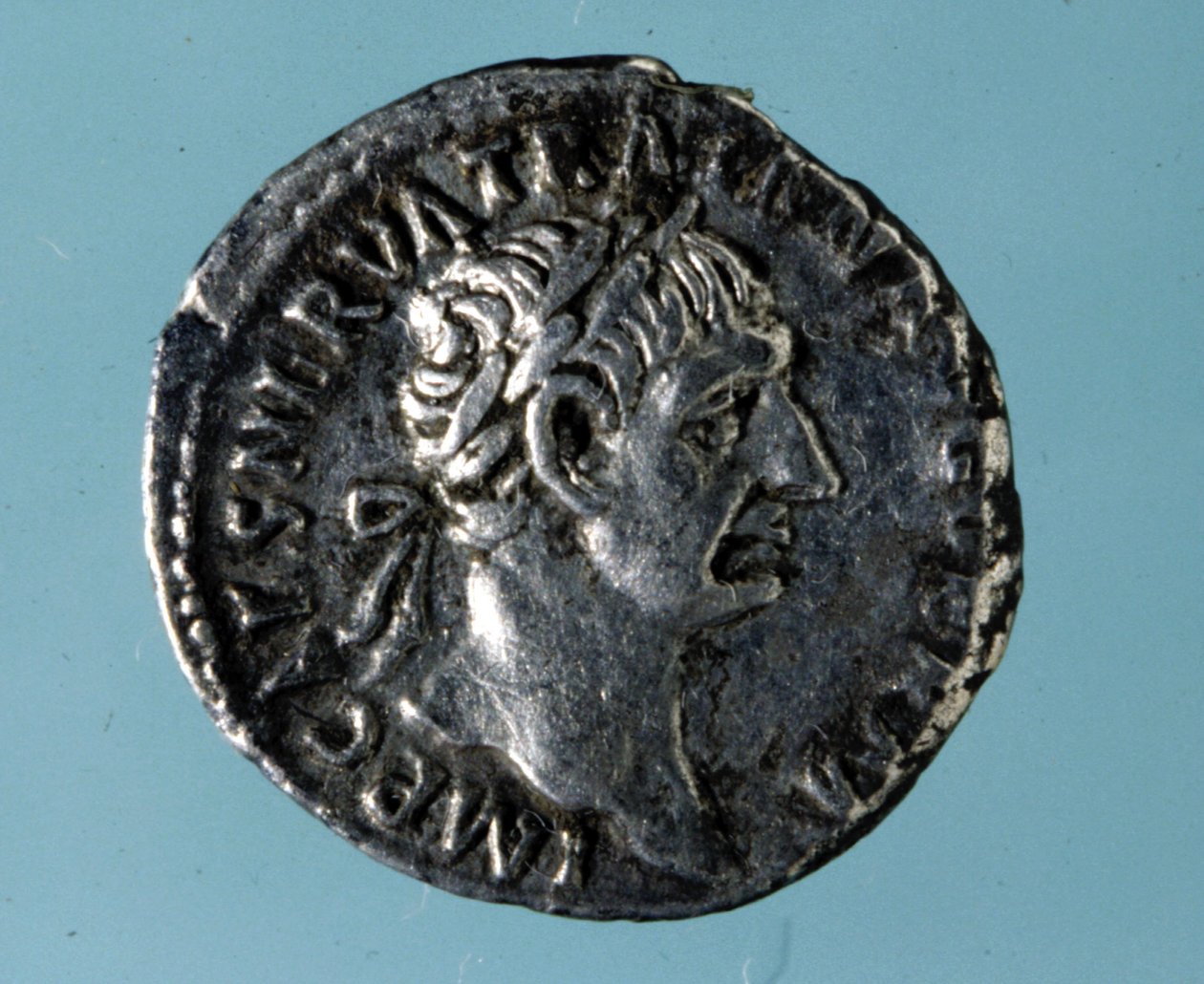 Silver coin with the effigy of the Roman Emperor Nerva (26 - 98). by Roman