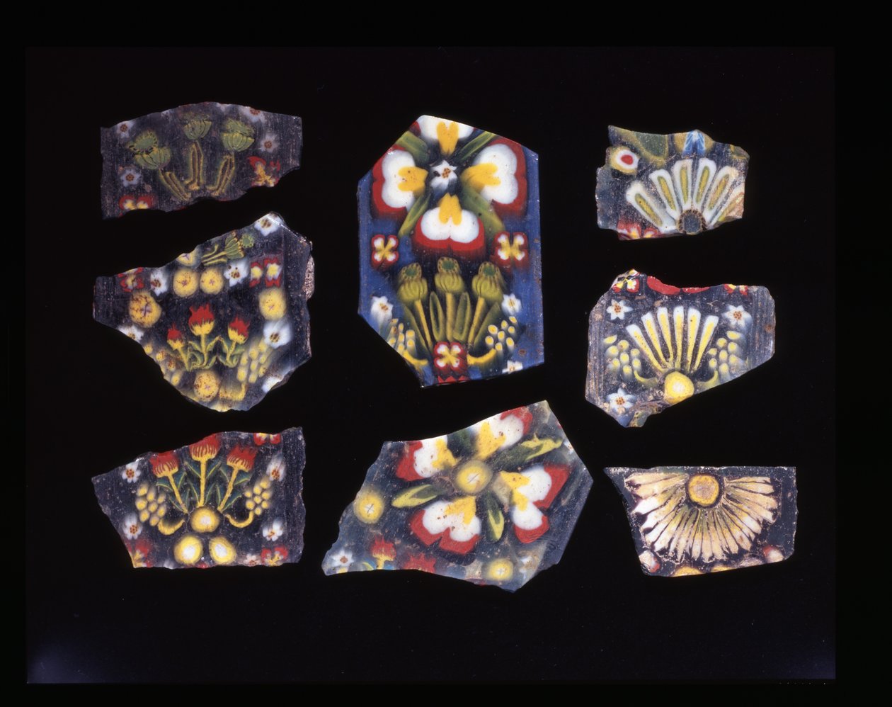 Eight floral fragments of architectural plaques, mosaic glass technique, c.1st century BC - 1st century AD by Roman Roman
