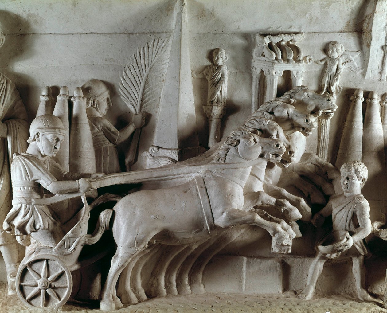 Sculpted relief representing a quadriga, chariot pulled by four horses by Roman Roman