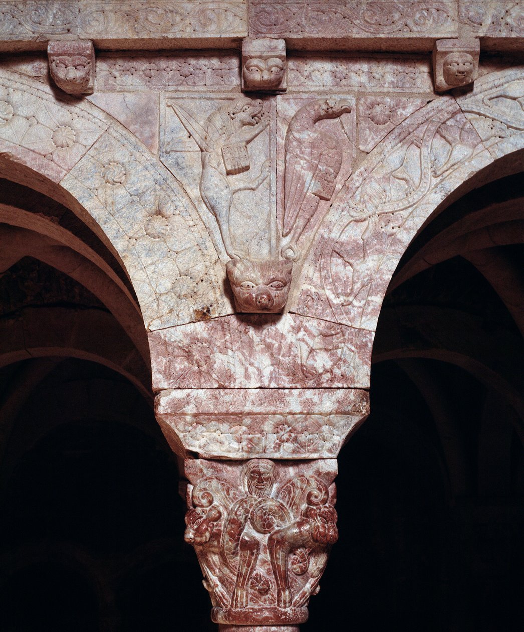 Symbols of evangelists John and Marc, carved on the tribune of the Priory (detail) by Romanesque