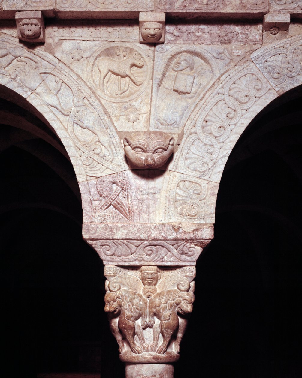 Detail of the lamb of God and symbol of evangelist Luke, carved on the tribune of the Priory by Romanesque