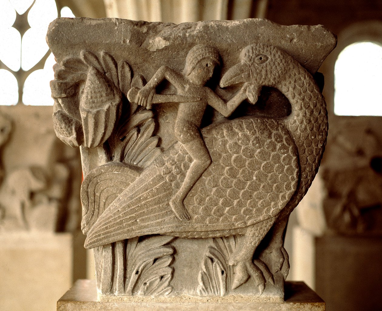 Representation of a combat between a man and a bird (carved capital of the chapter house) by Romanesque