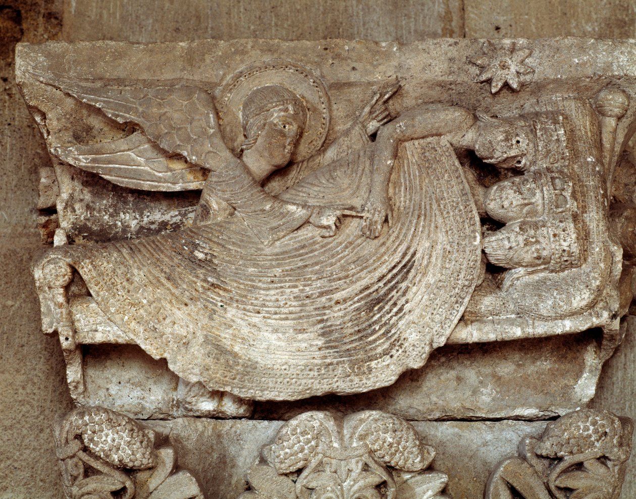 The Magi asleep with an angel awaking them and pointing towards the star of Bethlehem (carved capital) by Romanesque
