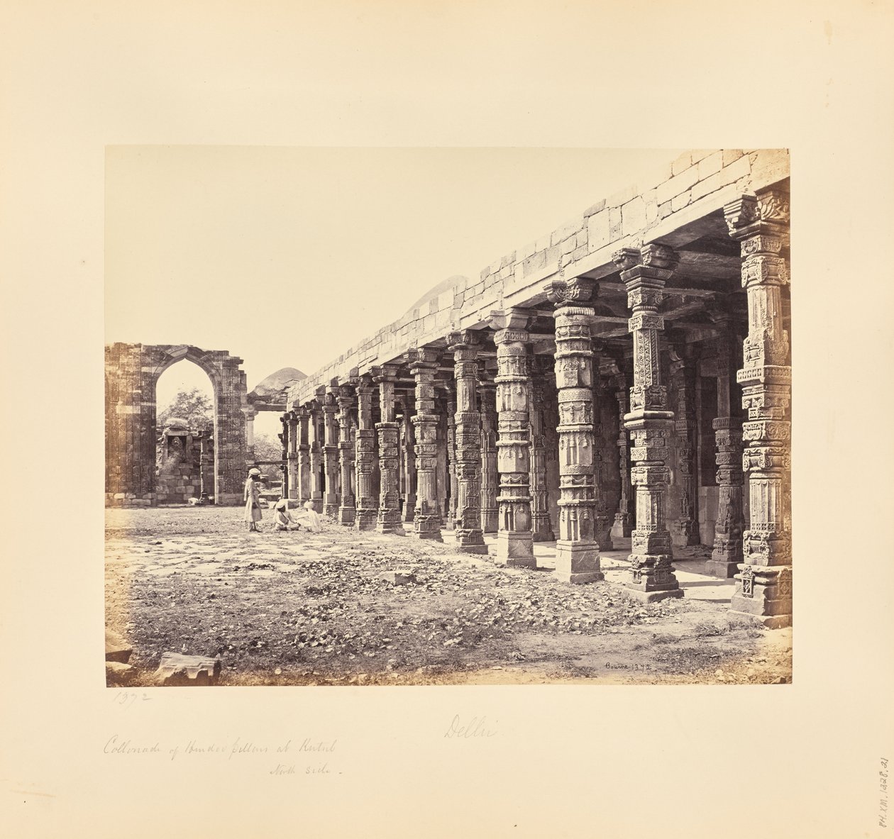 Delhi; Colonnade of Hindu Pillars, at the Qutb Minar, North Side by Samuel Bourne