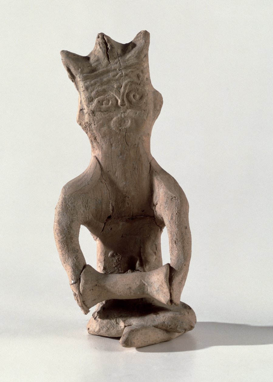 Cross-legged figure with an object thought to be a drum, from Susa, Iran, 4th-6th century AD by Sasanian School