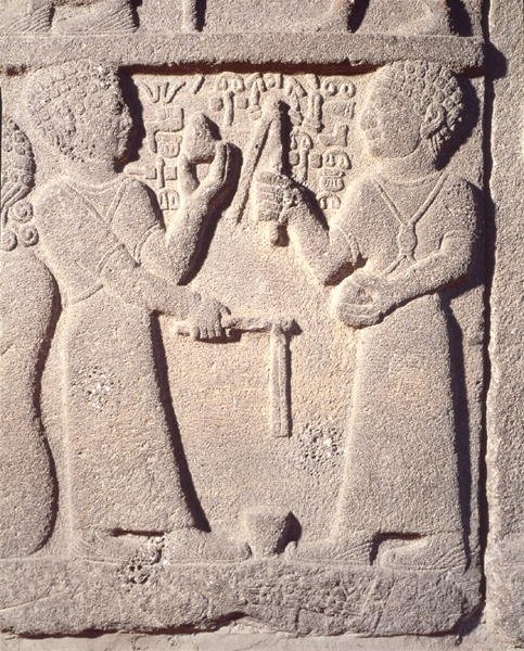 Relief depicting two boys playing with a spinning top, from Carchemish, Turkey, Neo-Hittite by School Assyrian