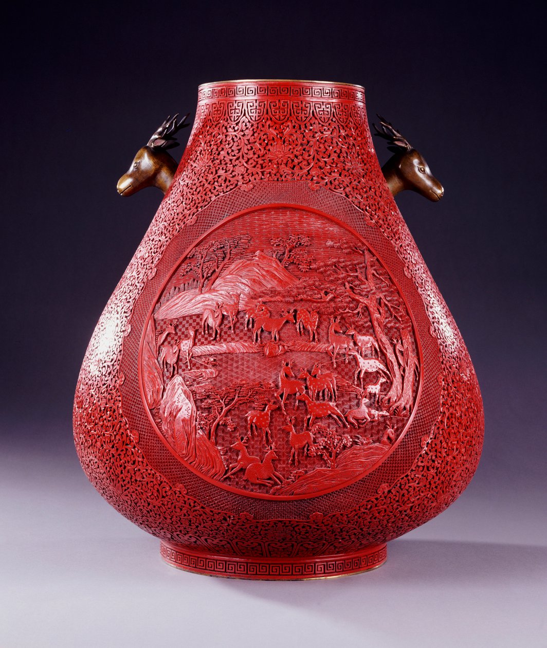 A Large Carved Red Lacquer Pear-Shaped Vase by School Chinese