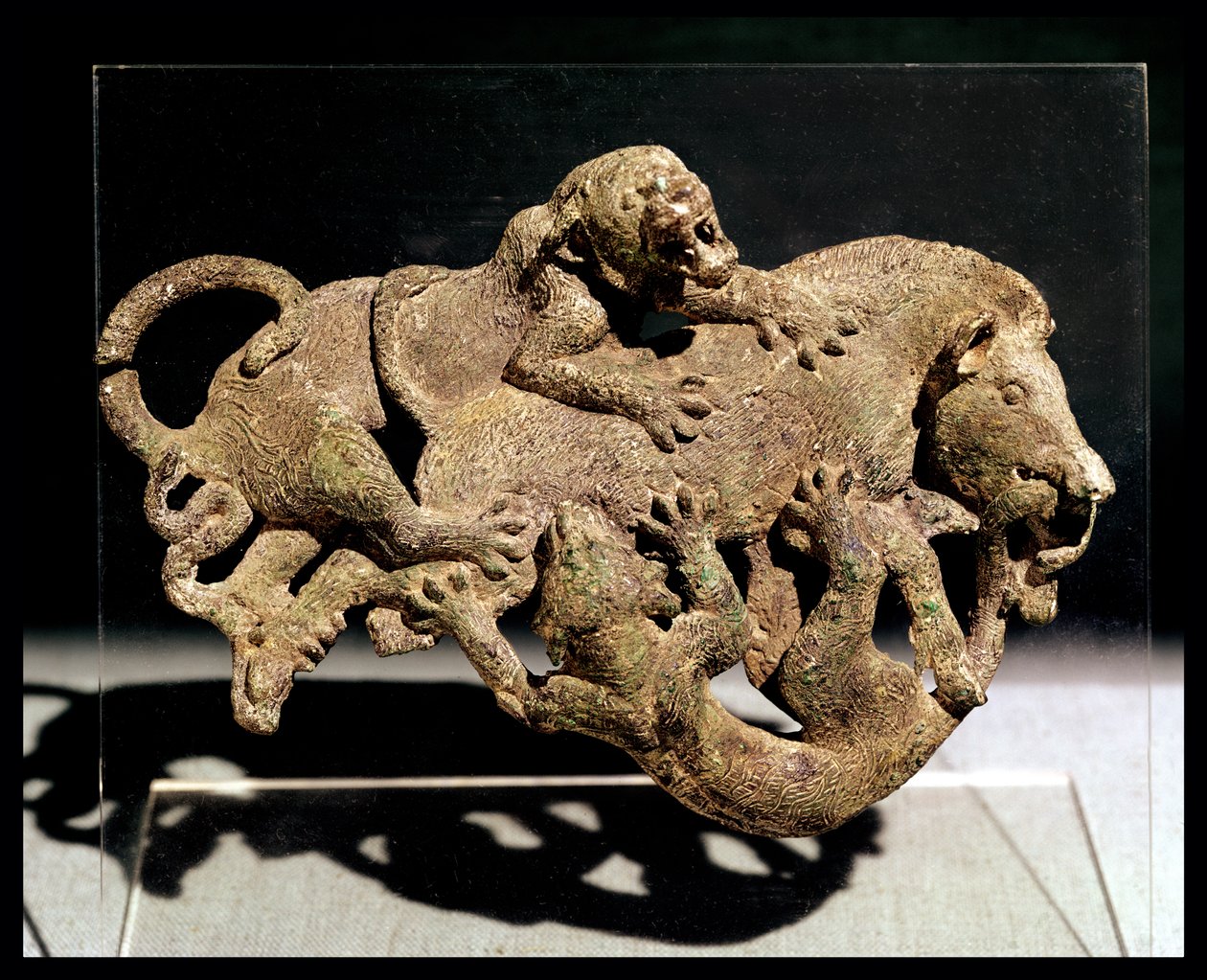Ornamental plaque depicting a wild boar struggling with two tigers, from Tomb 3 at Shih-chai-shan, Yunnan Province, Western Han Dynasty, 2nd-1st century BC by School Chinese