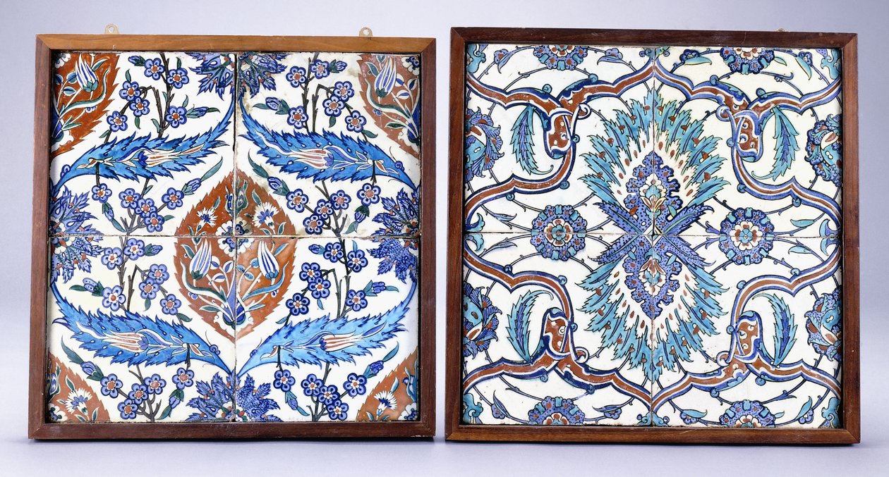 An Iznik tile with plum blossoms and tulips, made circa 1570, and a 17th century Iznik tile with red and blue split palmette by School Turkish