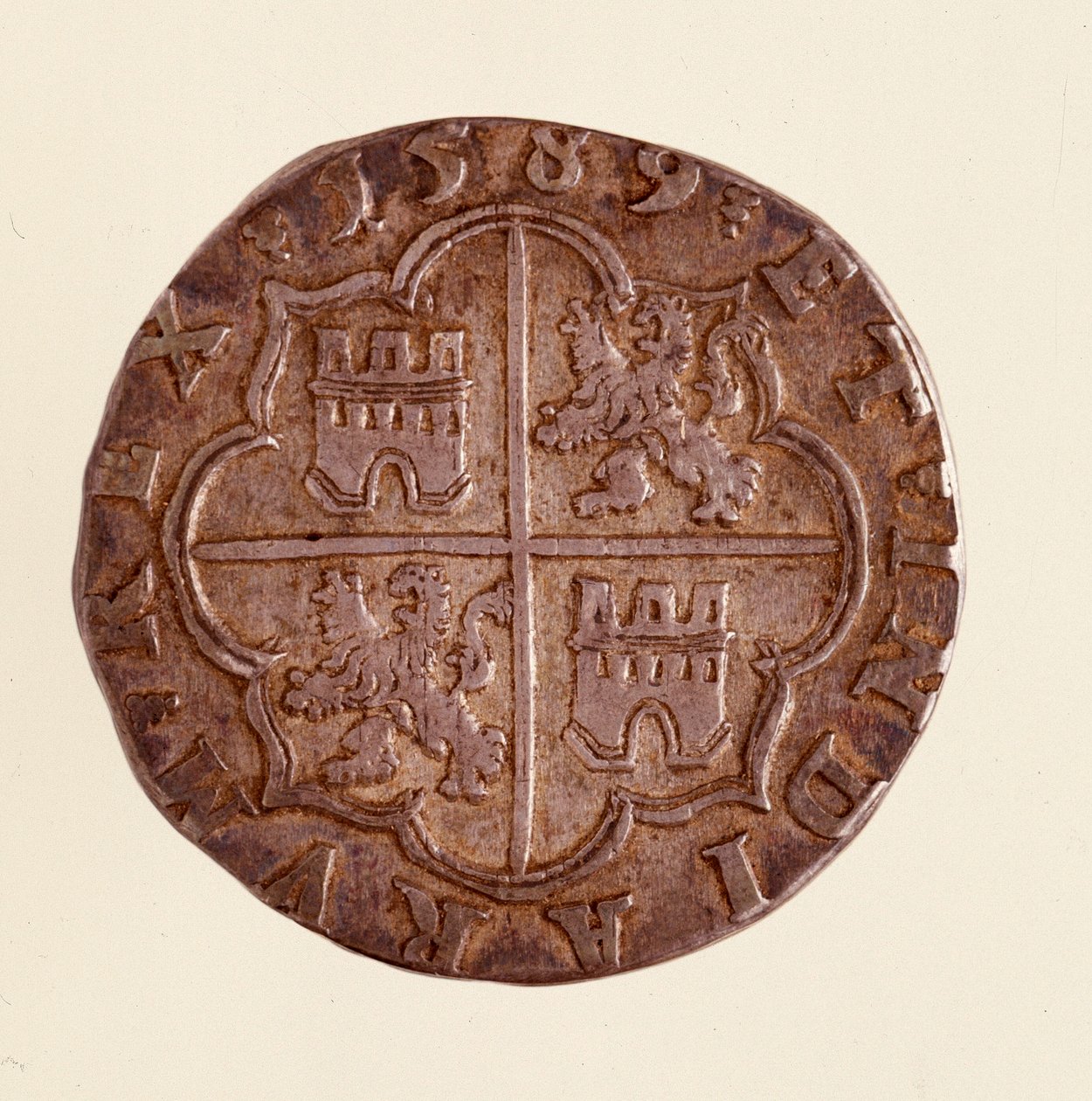 Silver coin (8 reales) from Spain: reign of Philip II (1556-1598). 1589 Diameter 3.5 cm by Spanish School