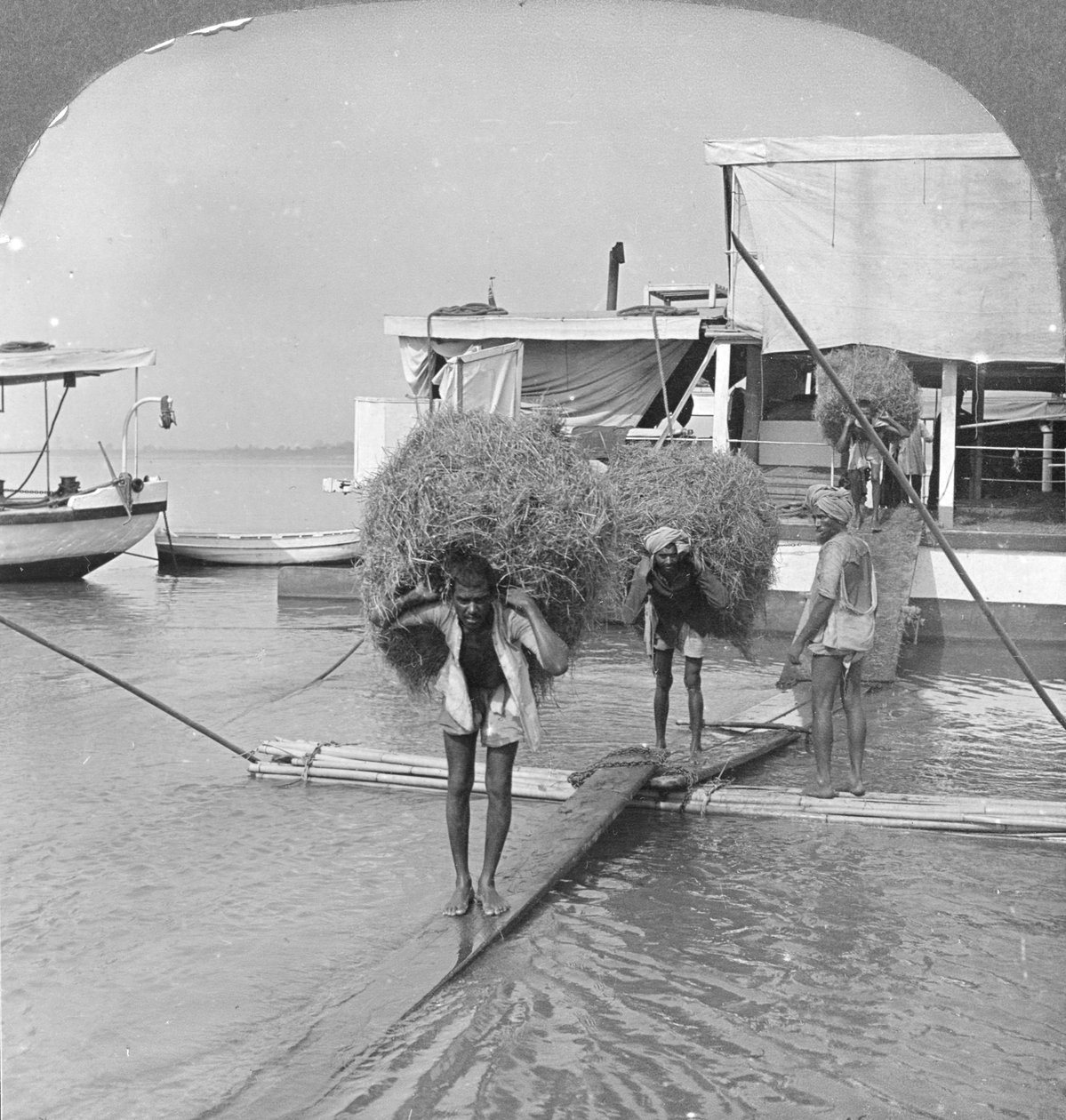 Unloading a Vessel on the Irrawaddy River, Burma, 1908 by Stereo Travel Co