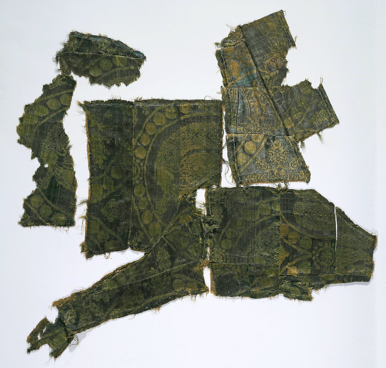 Fragments of a Caftan Covered with a Silk Fabric with a Simurgh Pattern, Moshchevaya Balka Burial Mound, Eastern Mediterranean by Syrian School