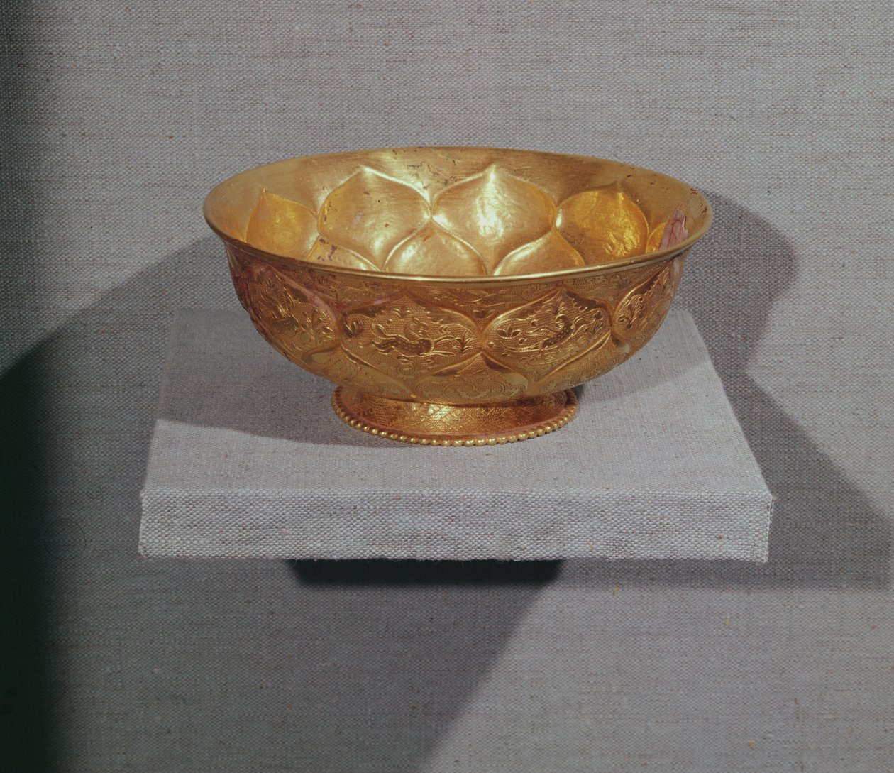 Bowl decorated with embossed lotus petals by Tang Dynasty Chinese School