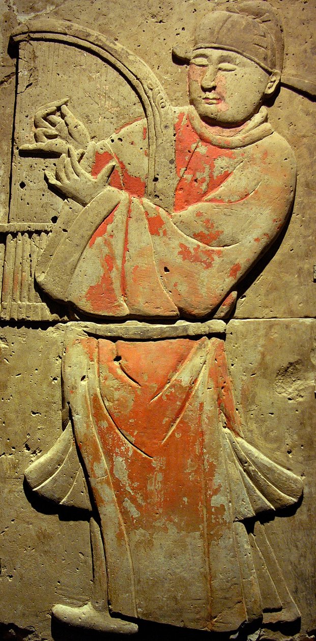 Terracotta stele with musician, Tang Dynasty (618-907), discovered in Shaanxi Province, Steles Forest Museum in Xian. Photography, Leonard de Selva, China, 2006. by Tang Dynasty Chinese School