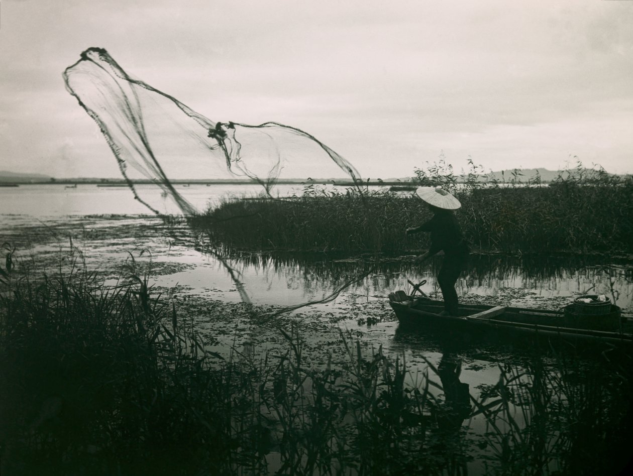 Japanese Fisherman Casting His Nets on a Lake, circa 1900 - 1915 by Teijiro Takagi