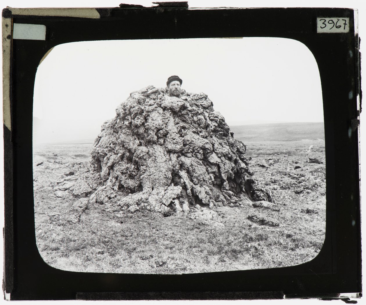 Man Standing in a Spiracle on a Lava Plain by Tempest Anderson