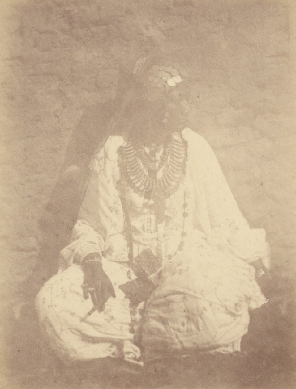 Portrait of a North African Woman Sitting Against a Wall by Théodule Devéria