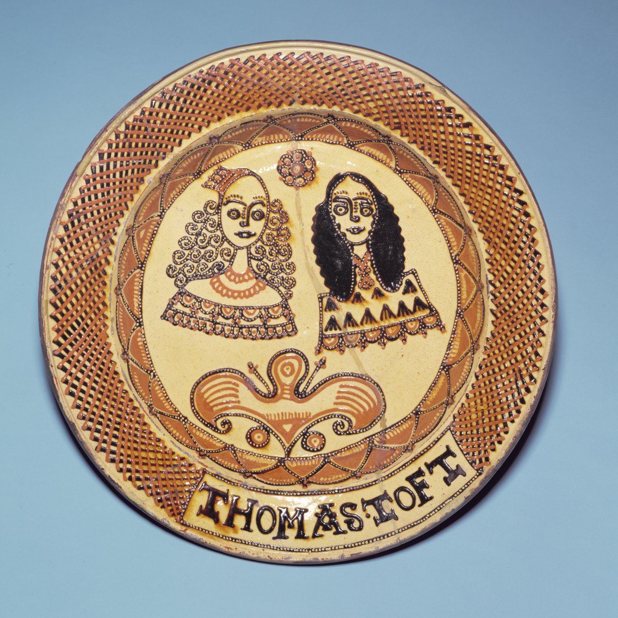 Staffordshire plate depicting King Charles II and Queen Catherine of Braganza by Thomas Toft