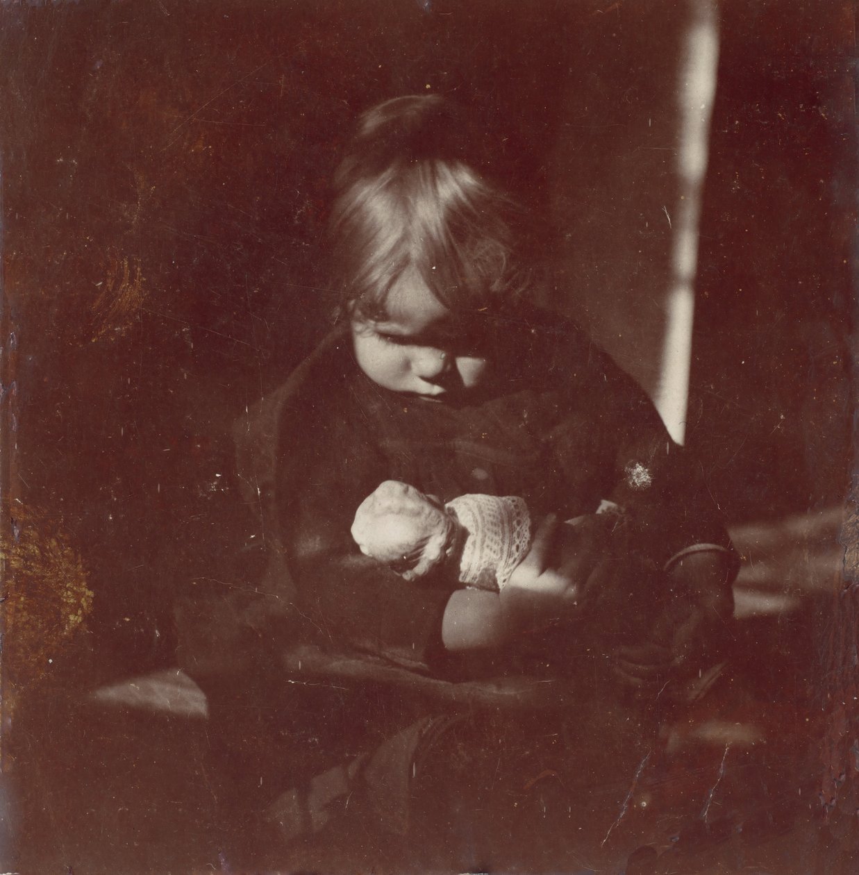Betty Reynolds with Doll on Lap, ca. 1885 by Thomas Eakins