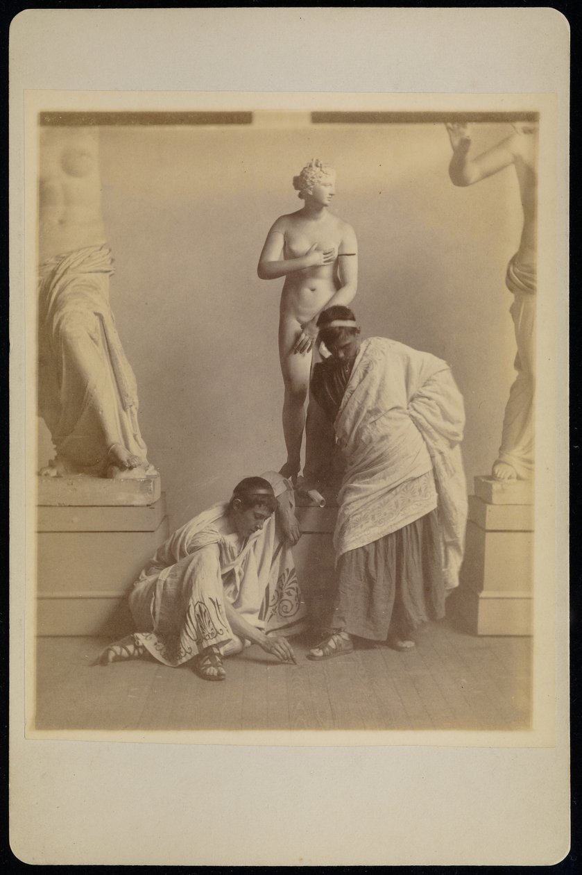 Two Male Students in Grecian Costume Before a Plaster Cast of Aphrodite in the Cast Room of the Pennsylvania Academy by Thomas Eakins