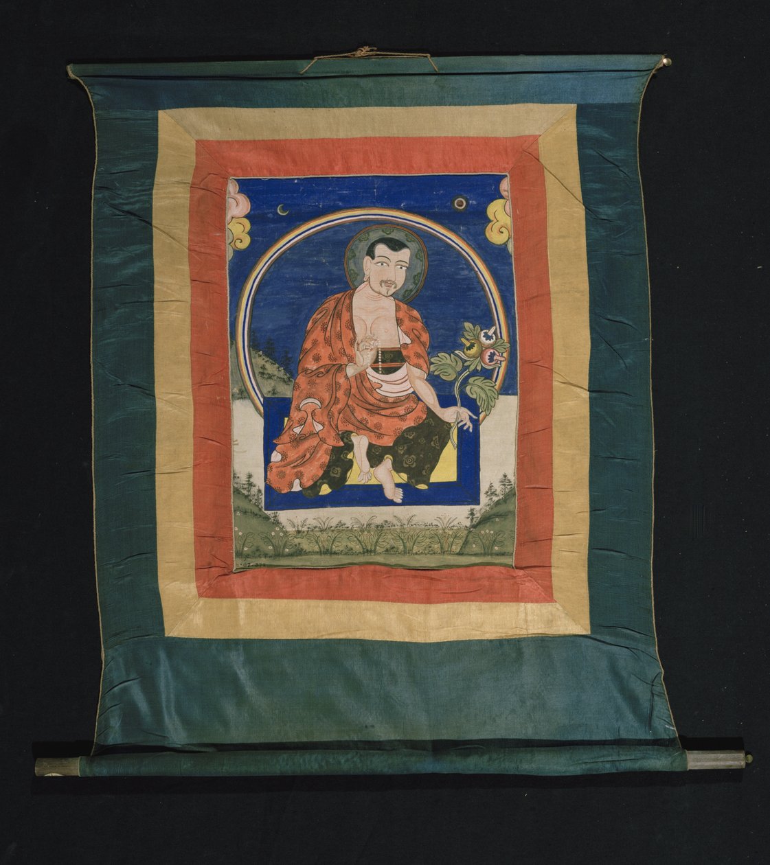 Thangka painting depicting Arhat in monks robes holding mala prayer beads in his right hand and the stem of a plant with leaves and three flowers in his left hand by Tibetan School