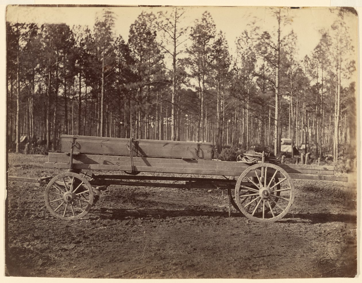 Wagon with Oblong Box Possibly Carrying Guns or Rifles by Timothy H. O