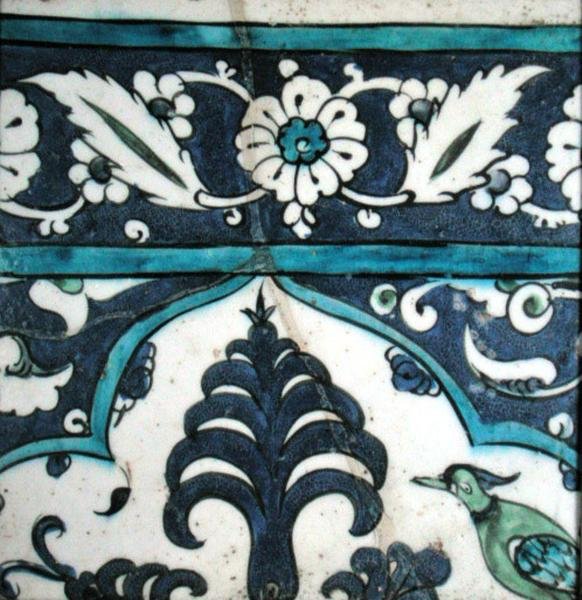 Isnik tile with floral design and border by Turkish School