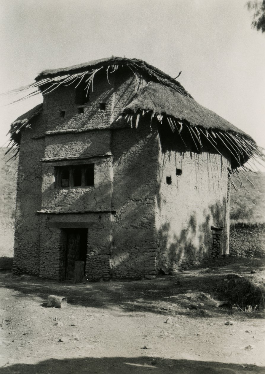Square hut with thatched roof, Axum, Ethiopia by Ugo Monneret de Villard