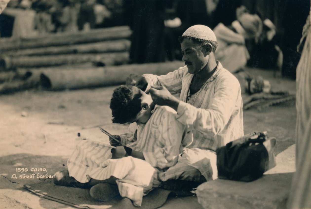 A Street Barber, Cairo, Egypt by Unbekannt