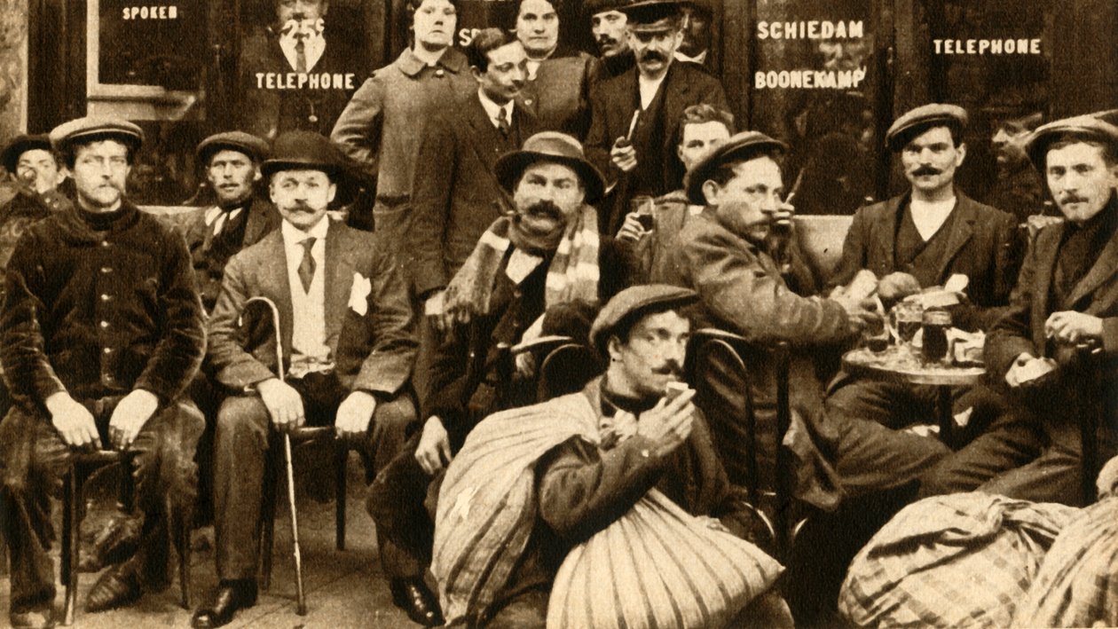 A Group of Refugee Field-Workers at a Café in Paris, First World War, 1914-1918 by Unbekannt