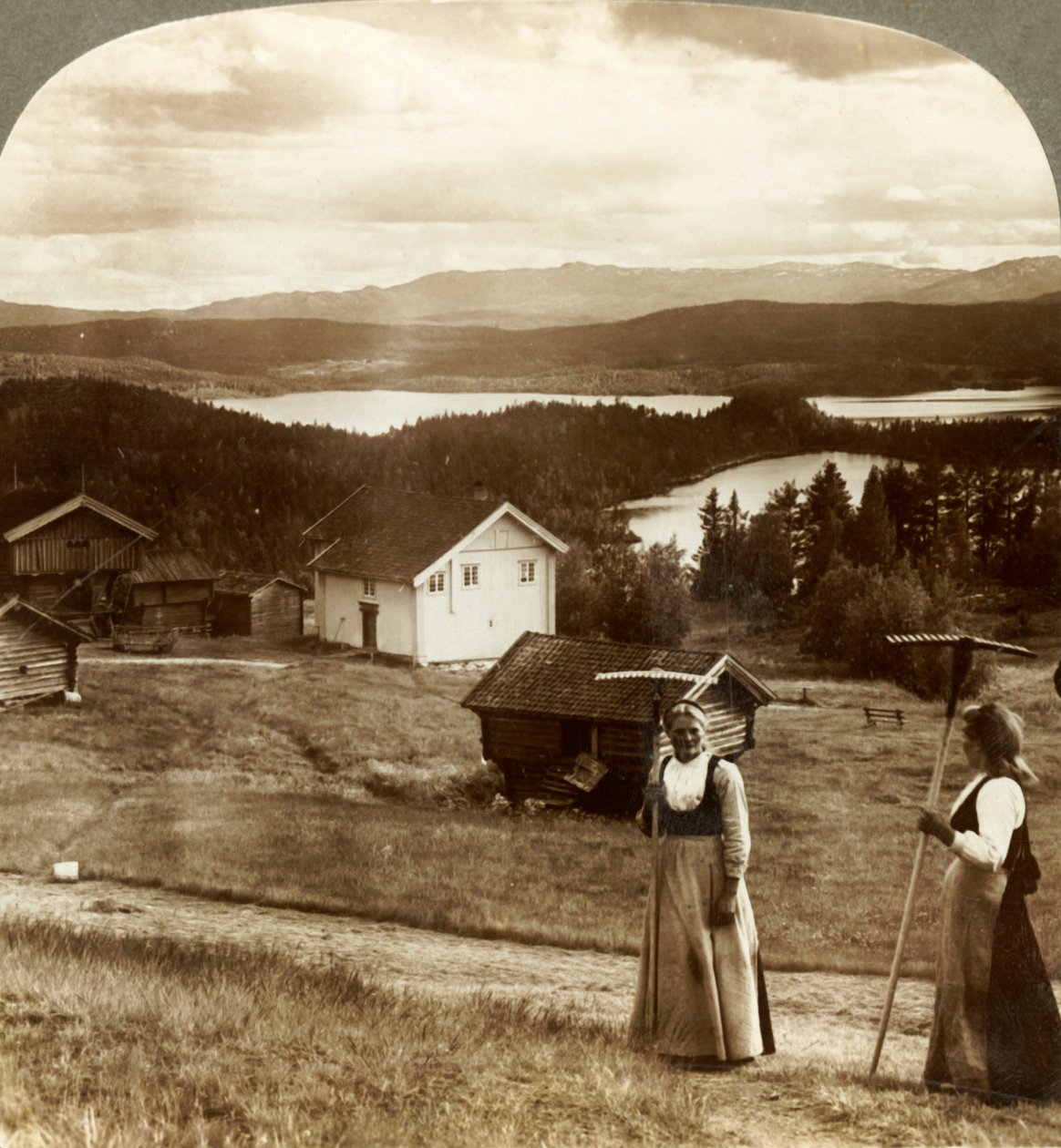 Country Girls in Haying Time - Over Bolkesjo and Folsjo Lakes to Himingen Mountains, Norway by Unbekannt