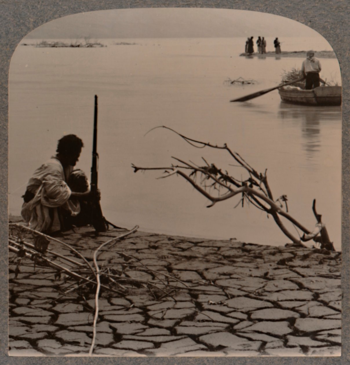 Fishermen by the Dead Sea: showing cracks on shore by Unbekannt
