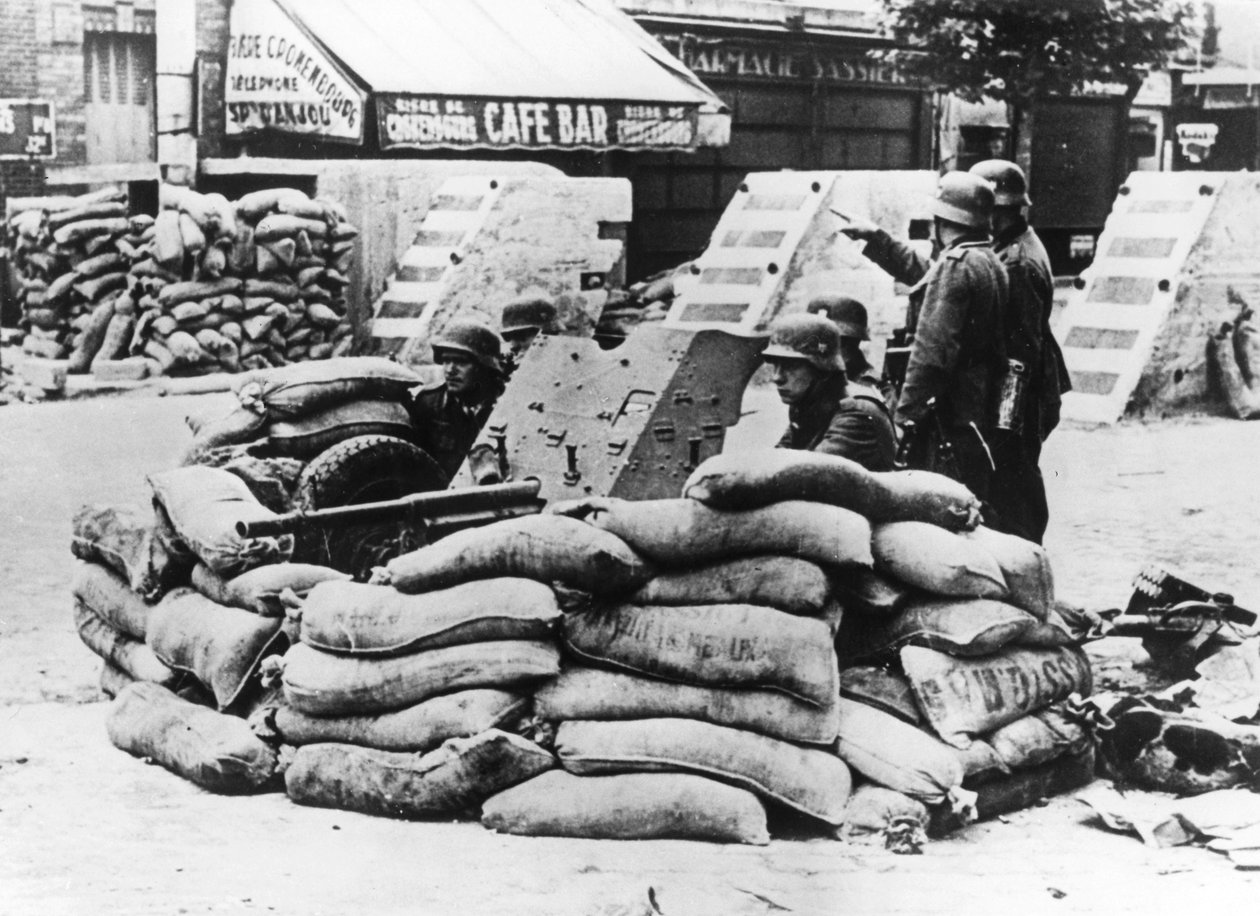 German Soldiers with Captured French Barricade, Near Paris, June 1940 by Unbekannt