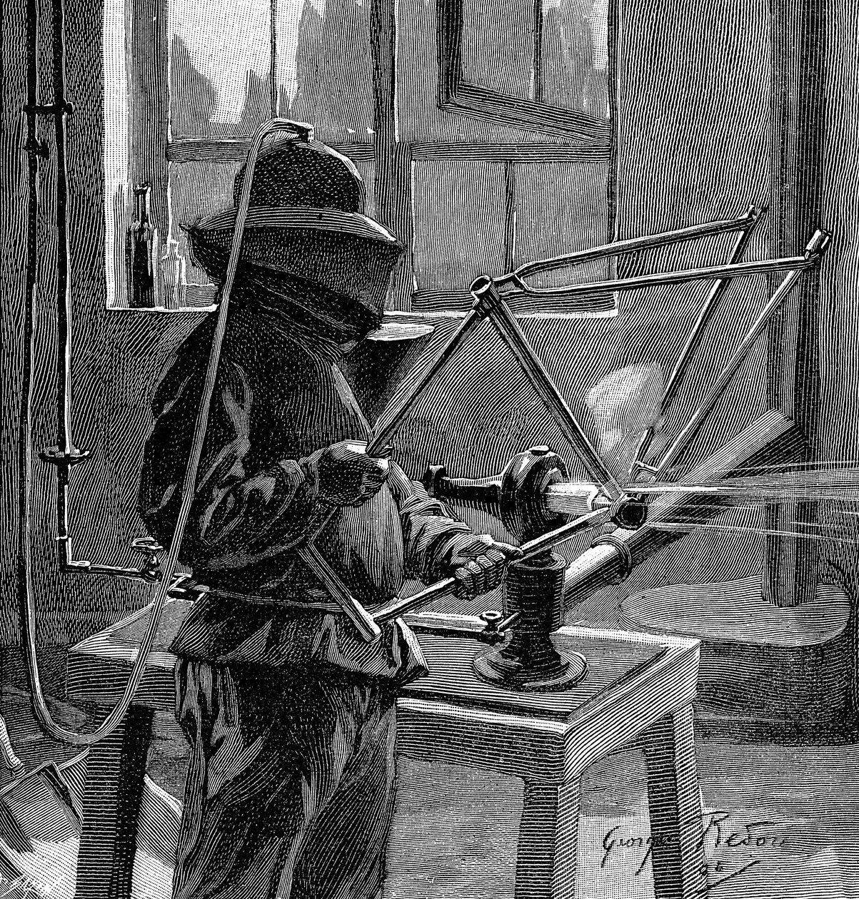 Sandblasting the Joints of a Bicycle Frame, France by Unbekannt