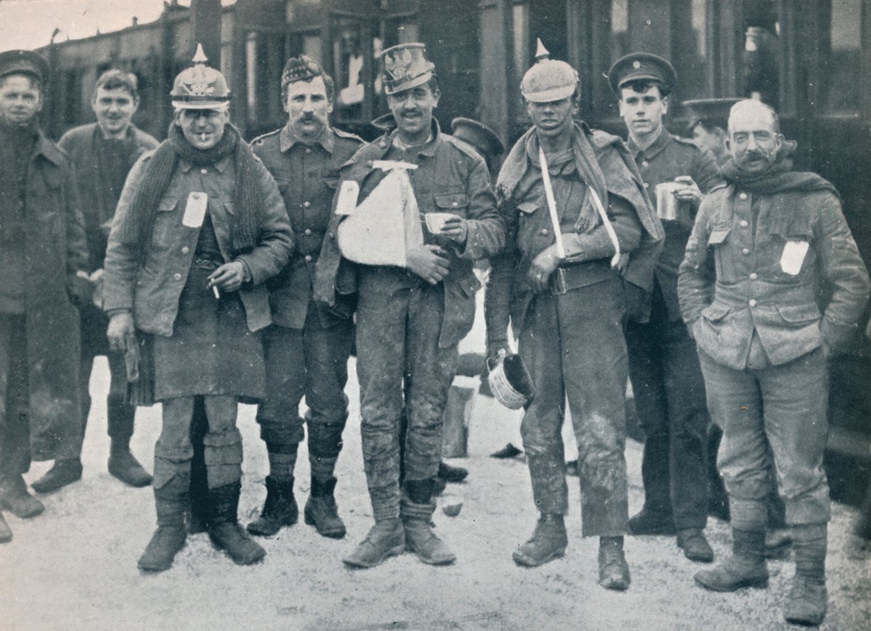 Some cheerful wounded from the Neuve Chapelle fighting, wearing captured German helmets, 1915 by Unbekannt