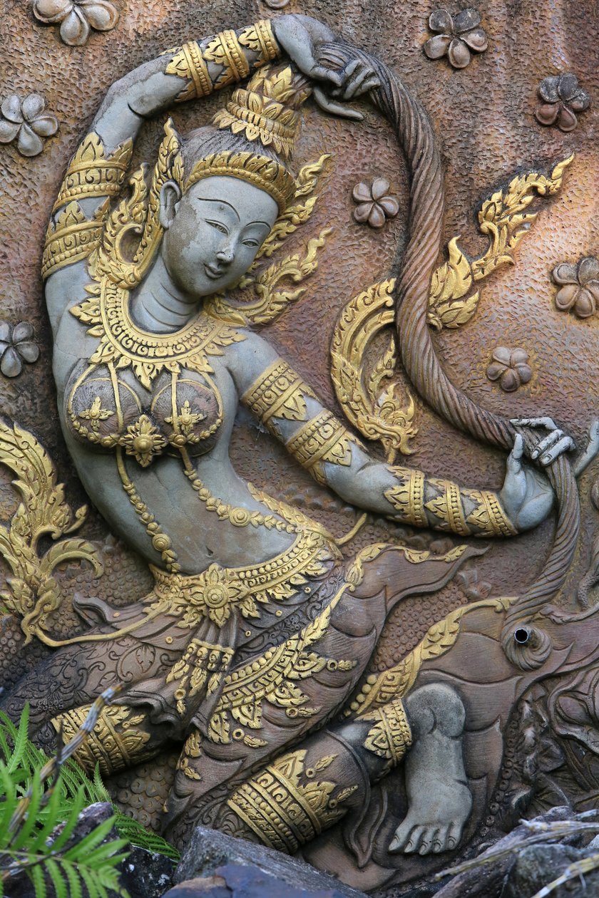 Statue of the goddess Phra Mae Thorani, Earth goddess protector of ...