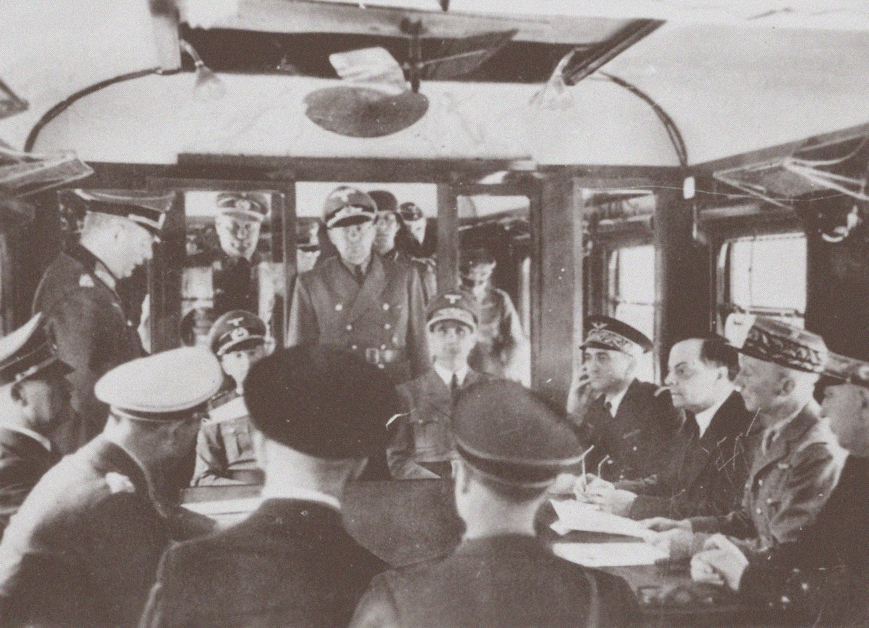 The German and French delegations inside a railroad car at Compiègne for the signing of France