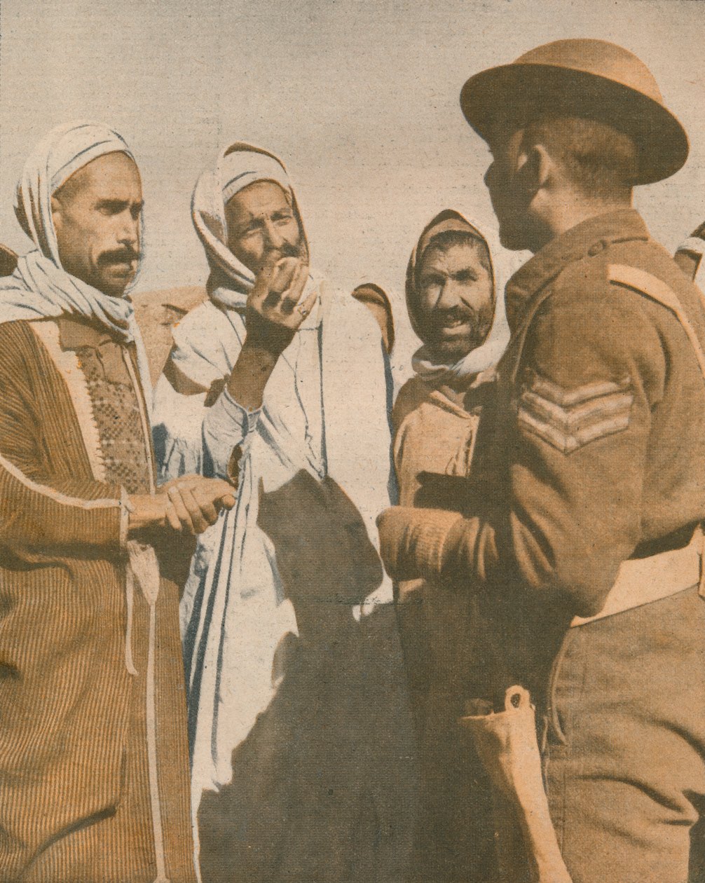 Tunisian Arabs Welcome a British Sergeant at Chaouach, 1943 by Unbekannt