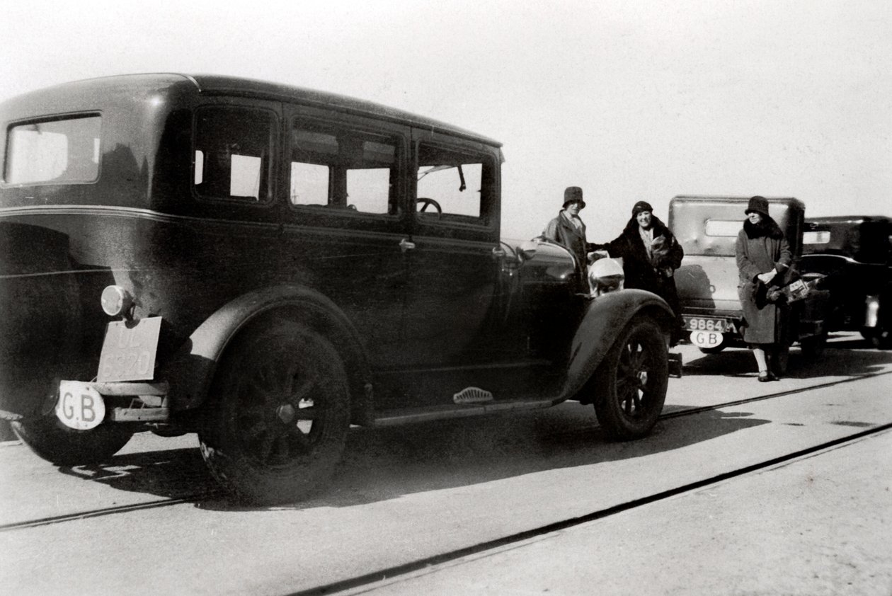 Women and parked cars by Unbekannt