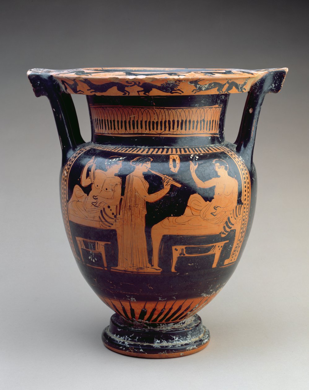 Attic Red-Figure Column Krater with a Symposium Scene of a Flute Player Between Two Reclining Males, Greek, c.420 BC by Unbekannt