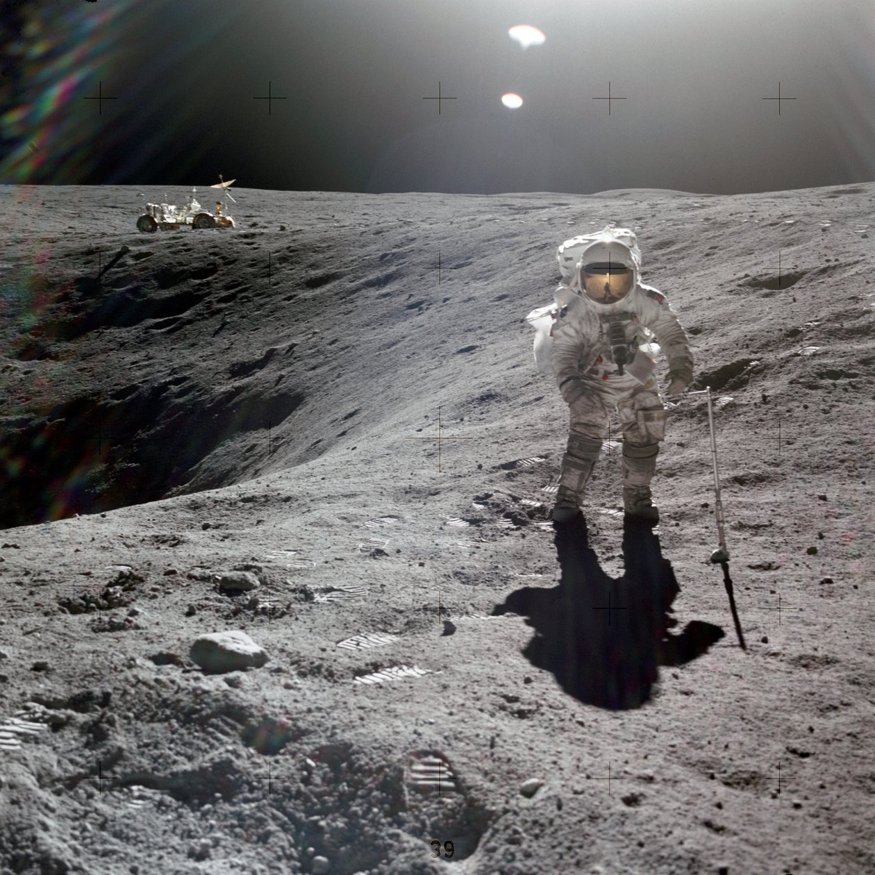 Charles M. Duke, Jr., lunar module pilot of the Apollo 16 mission, collecting lunar samples at the rim of Plum Crater, April 1972 by Unbekannt