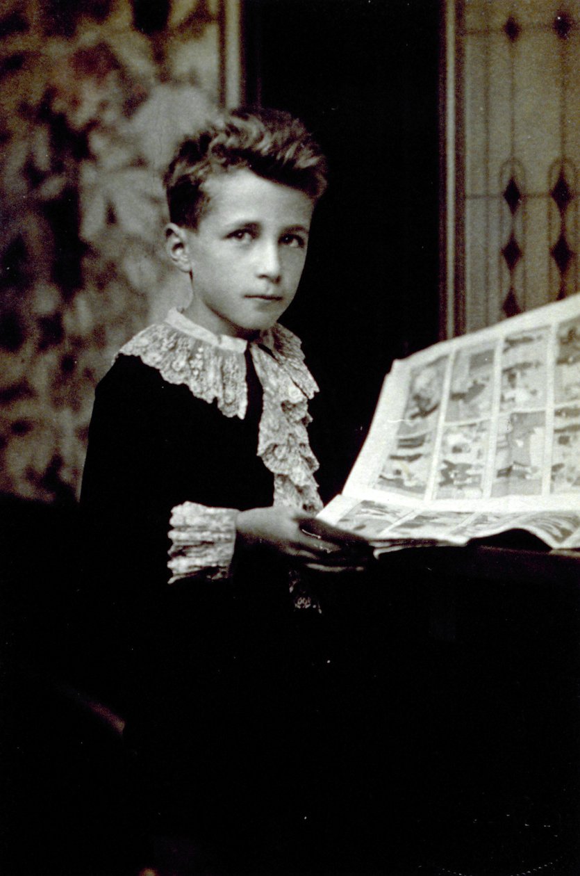 Half-Length Portrait of a Boy Leafing Through a Comic Book by Unbekannter Künstler