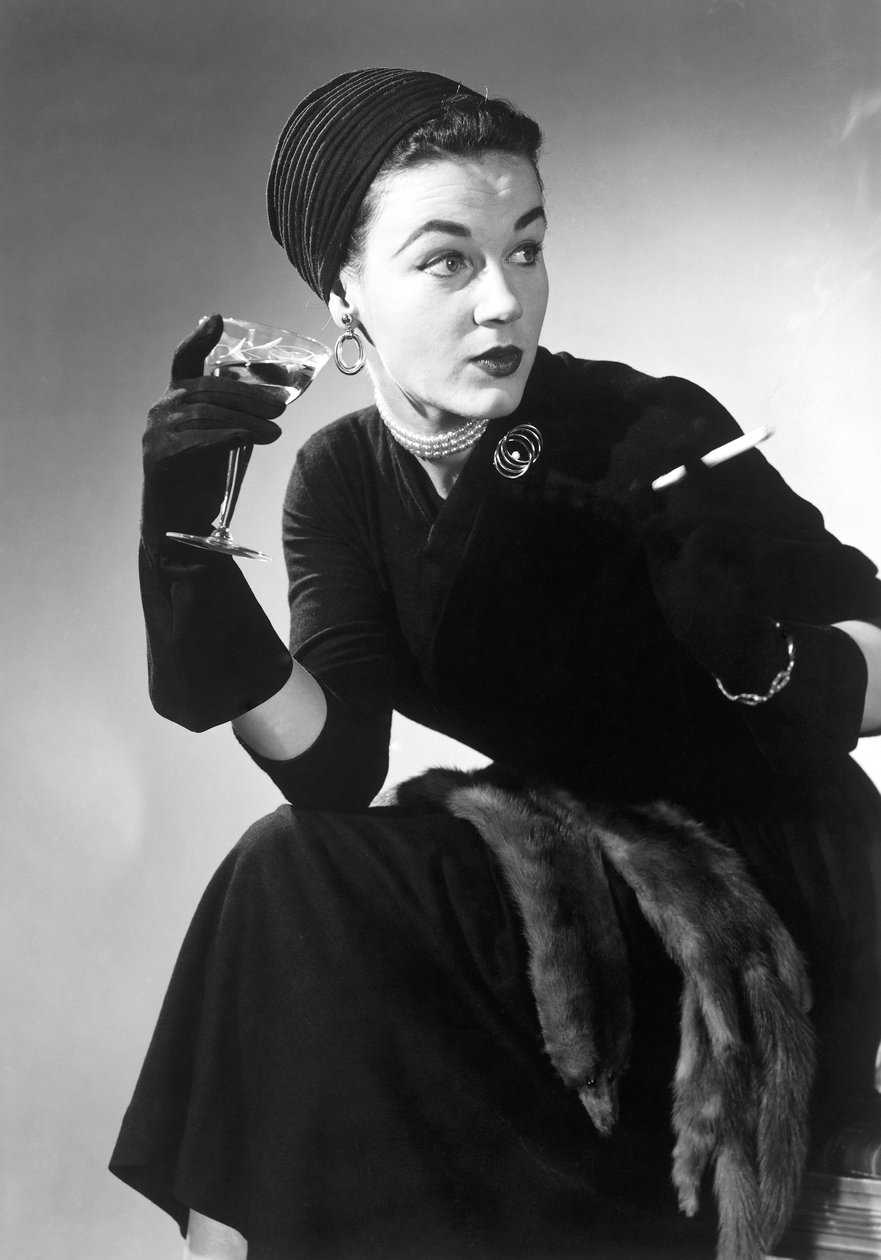 Woman in Evening Wear with Cocktail and Cigarette by Unbekannt