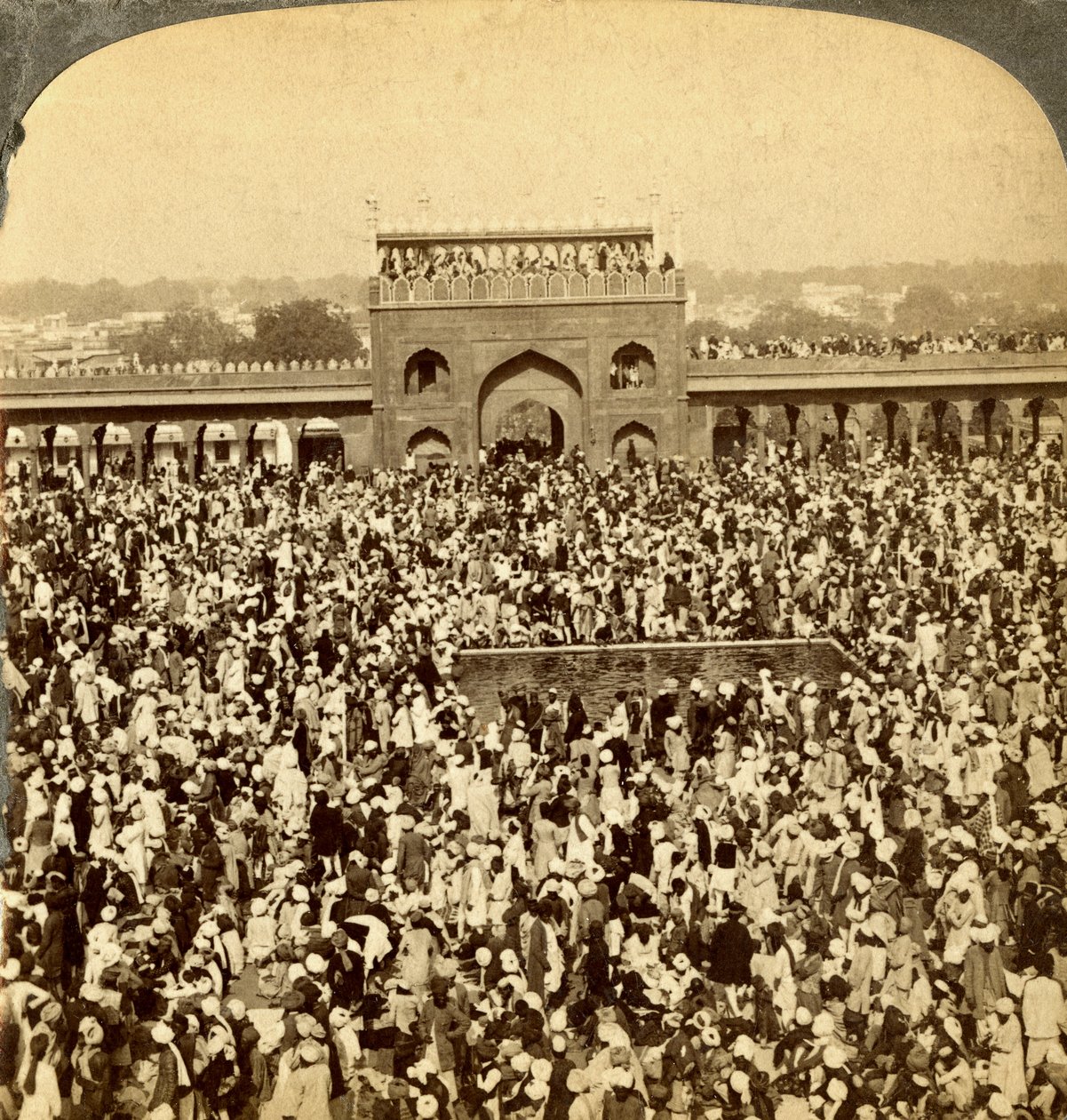 In the Court of the Jumma Mosque during the Annual Fast, Delhi, India by Underwood and Underwood