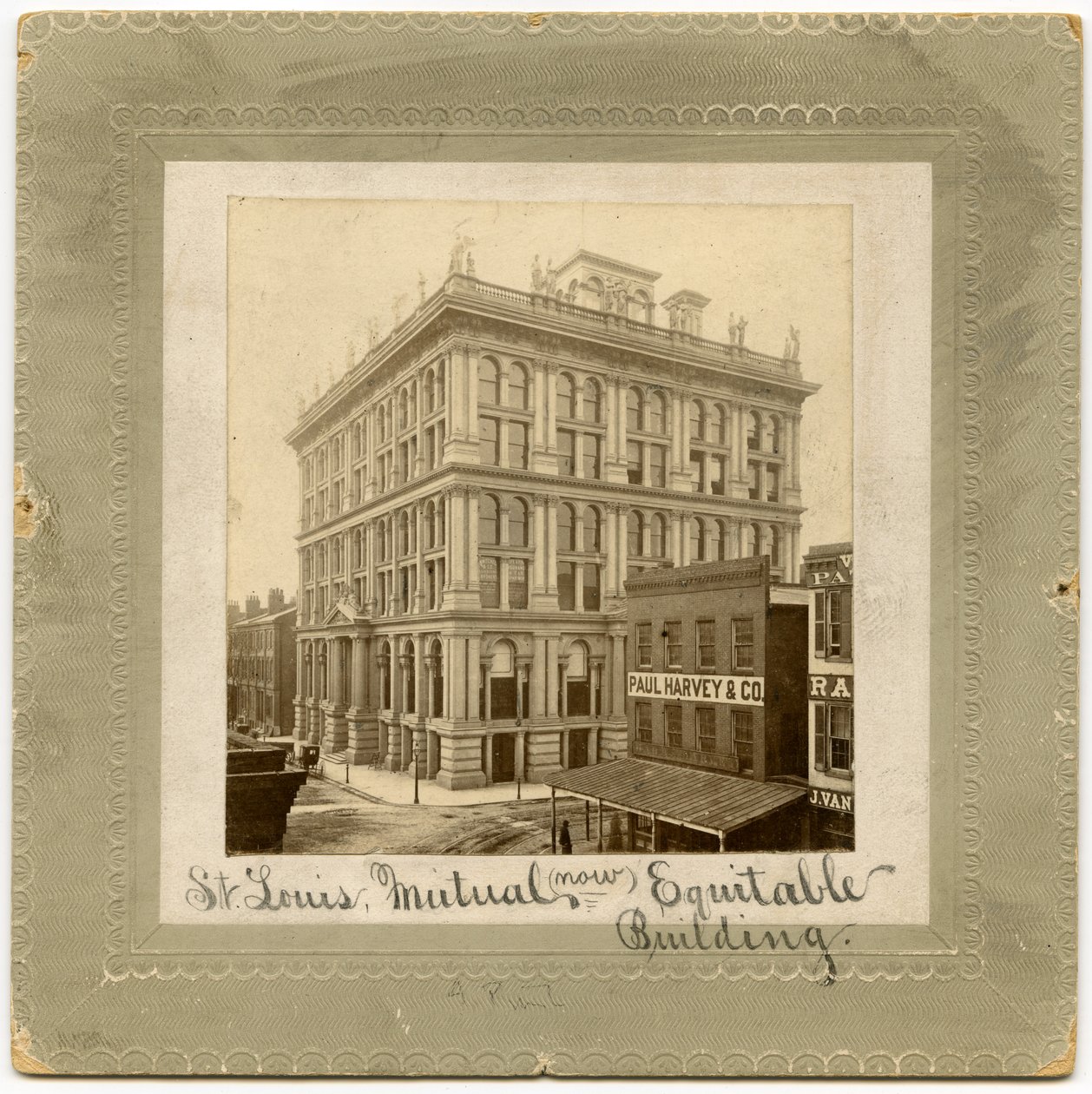 Photograph of a Six-Story Building with Figures Along the Top. Also Called St. Louis Life Insurance Building by Unknown