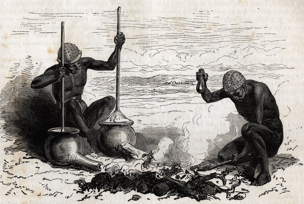 Blacksmiths Lakoutas (tribe located in the Upper Nile region), a forked wood branch serves as pliers, two stones serve as hammer and anvil, two earthen pots with long tubes at their base serve as bellows for charcoal fire, the pots are firm by a piece of s by Unknown artist