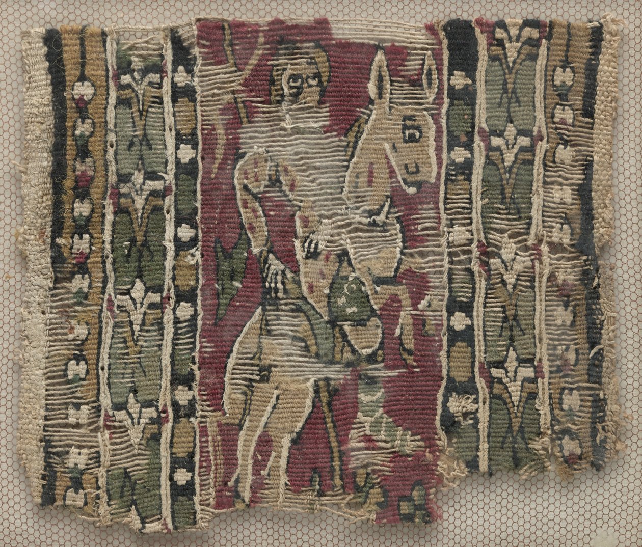 Fragment of a Clavus with Man on Horseback by Unknown artist