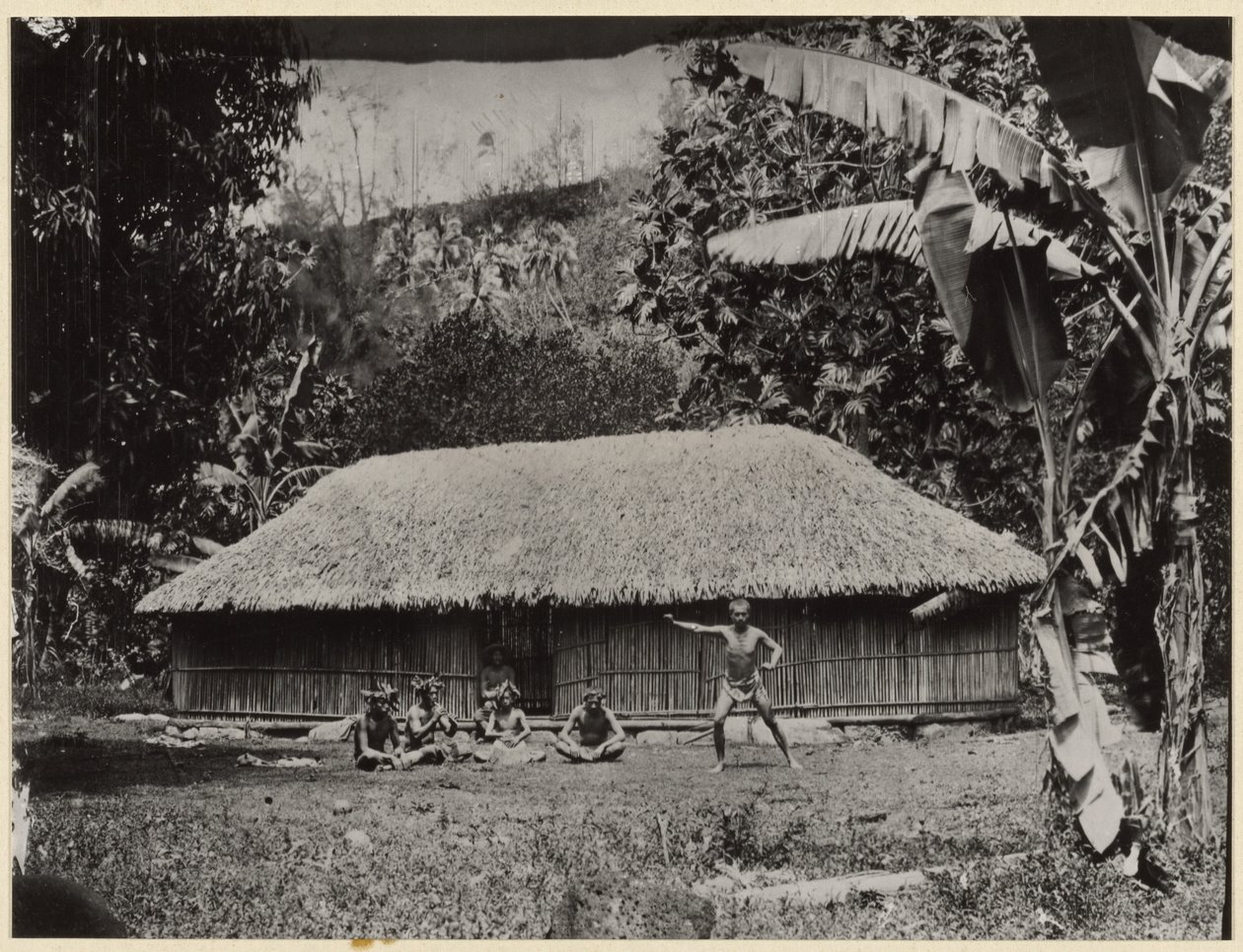Man Posed in Front of Hut by Unknown artist