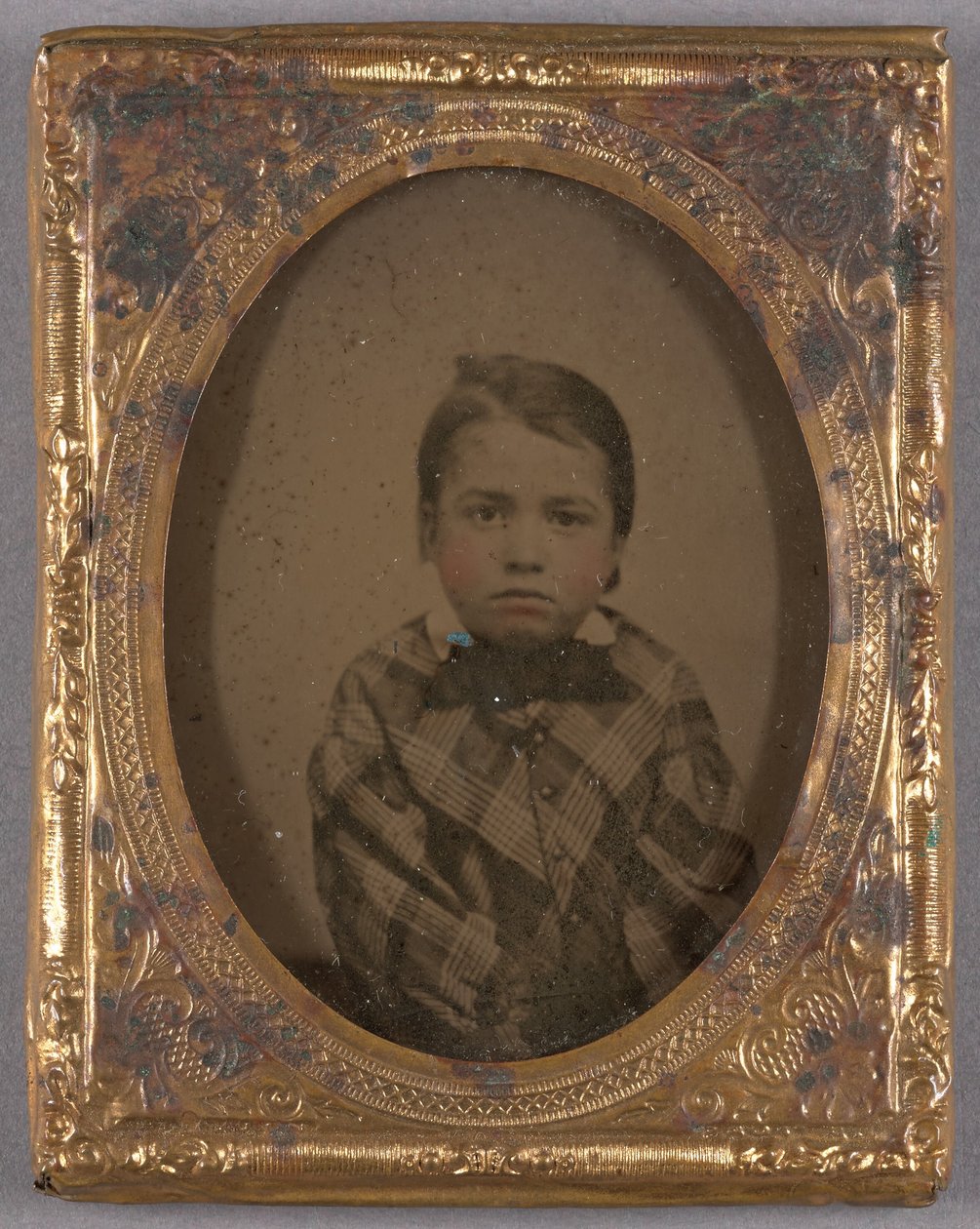 Portrait of a Little Boy in Checkered Coat and Bow Tie by Unknown artist